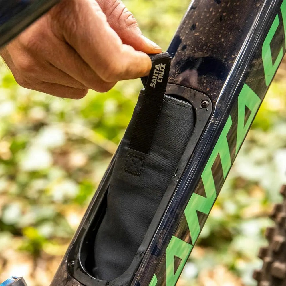 Pulling the tool wallet out of the Santa Cruz Bicycles Megatower's Glovebox