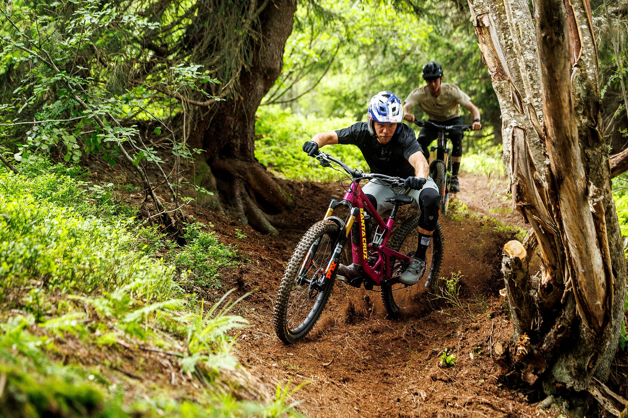 Laurie Greenland riding a steep trail on a Santa Cruz Bronson