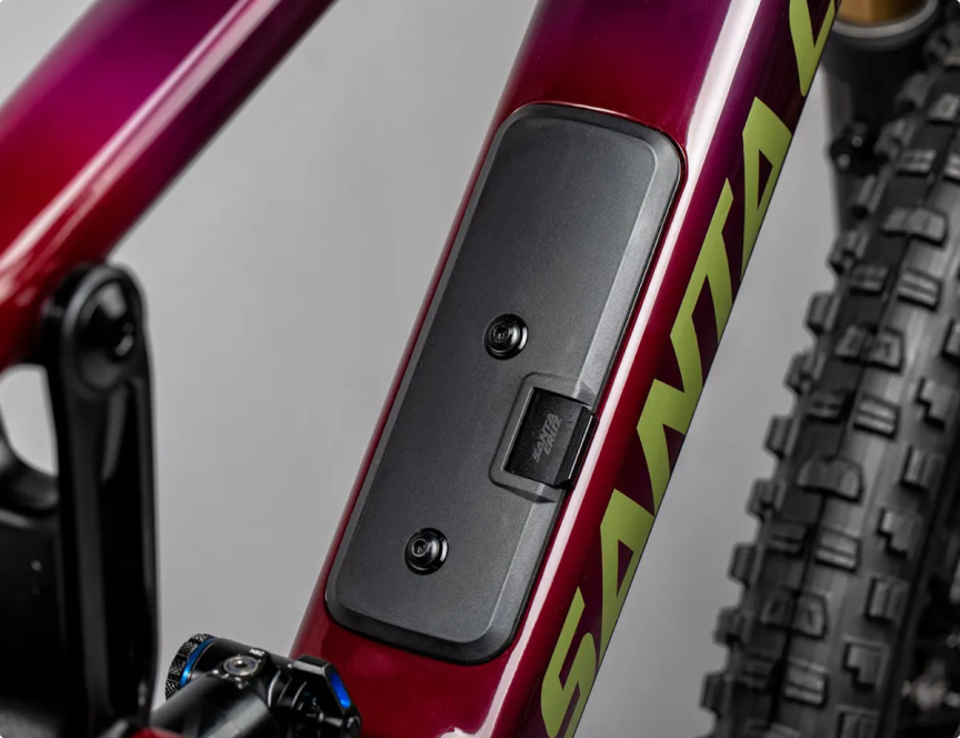 A close-up of the Glovebox feature on a Santa Cruz bike's frame, showcasing integrated storage and design