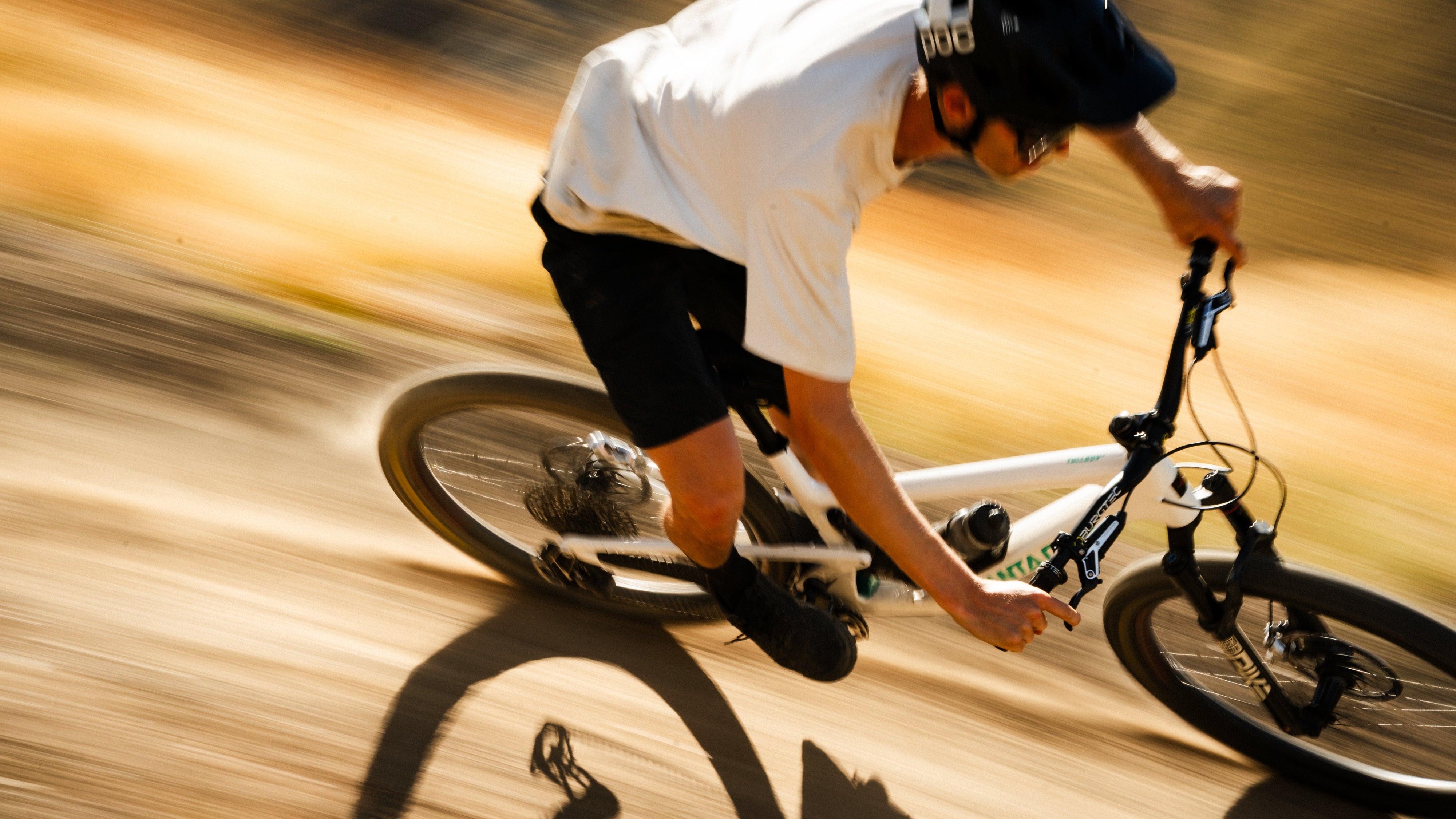 Ben Hildred riding a white Tallboy